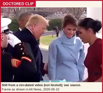 Altered image: a reduced, marked still from the doctored video, showing a woman in a light-blue coat in the foreground, a woman in a dark-red dress at right, and a man in a dark suit and a Marine in dress uniform behind them; the video itself is not hosted.
